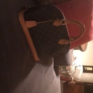 Louie Vuitton Alma PM Handbag